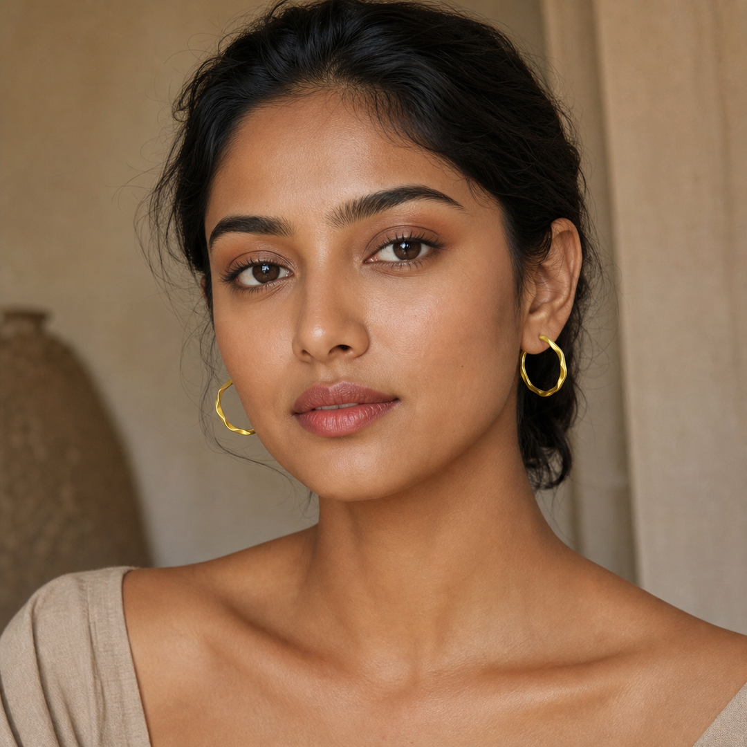 Wavy Medium Hoop Earrings - Brass - on-model detail - Tarashya Jewels