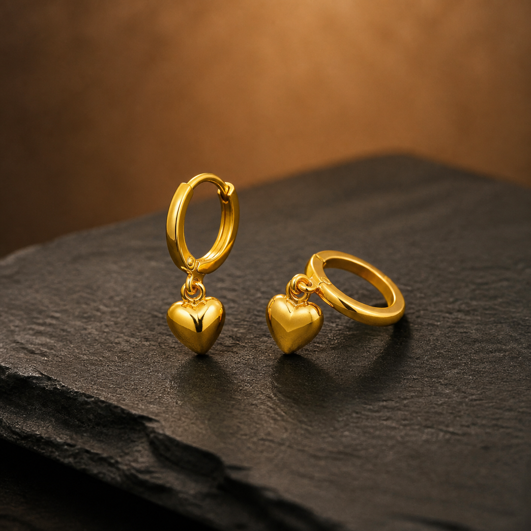 Mini Heart Huggie Earrings - Gold-Plated Brass - angled product view - Tarashya Jewels