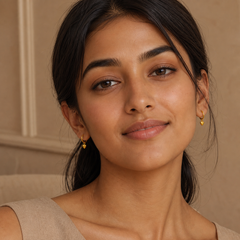 Mini Heart Huggie Earrings - Gold-Plated Brass - on-model detail - Tarashya Jewels