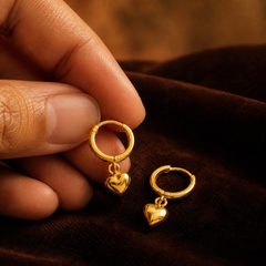 Mini Heart Huggie Earrings - Gold-Plated Brass - hand-held scale view - Tarashya Jewels