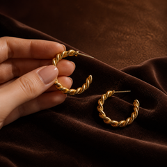 Twisted Bold Hoop Earrings - Gold-Plated Brass - hand-held scale view - Tarashya Jewels
