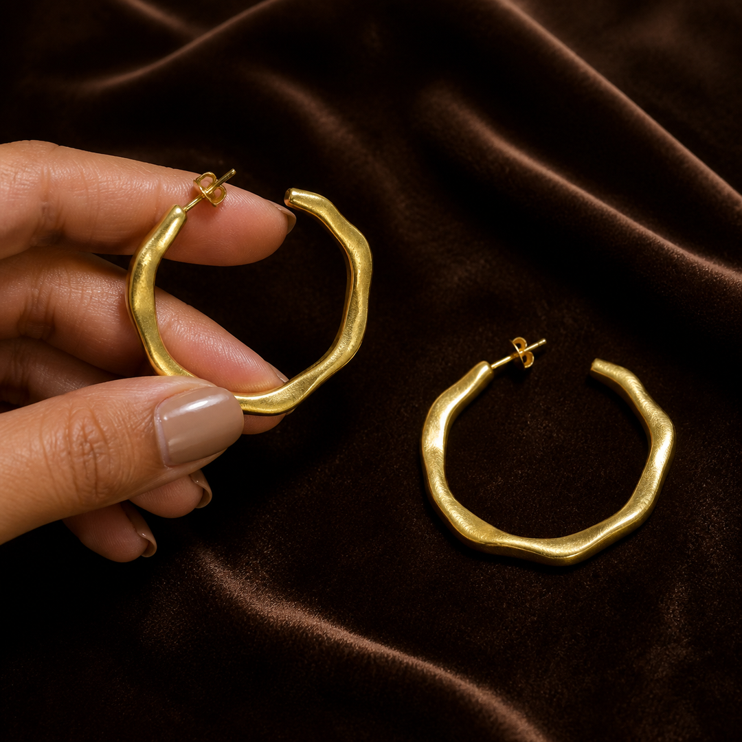 Wavy Medium Hoop Earrings - Brass - hand-held scale view - Tarashya Jewels