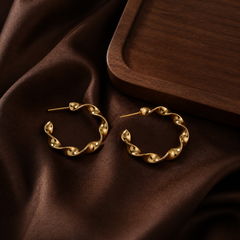 Spiral Twisted Hoop Earrings - Gold-Plated Brass - flat lay - Tarashya Jewels