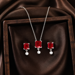 Red CZ Pendant Necklace & Earring Set - 925 Sterling Silver - flat lay - Tarashya Jewels