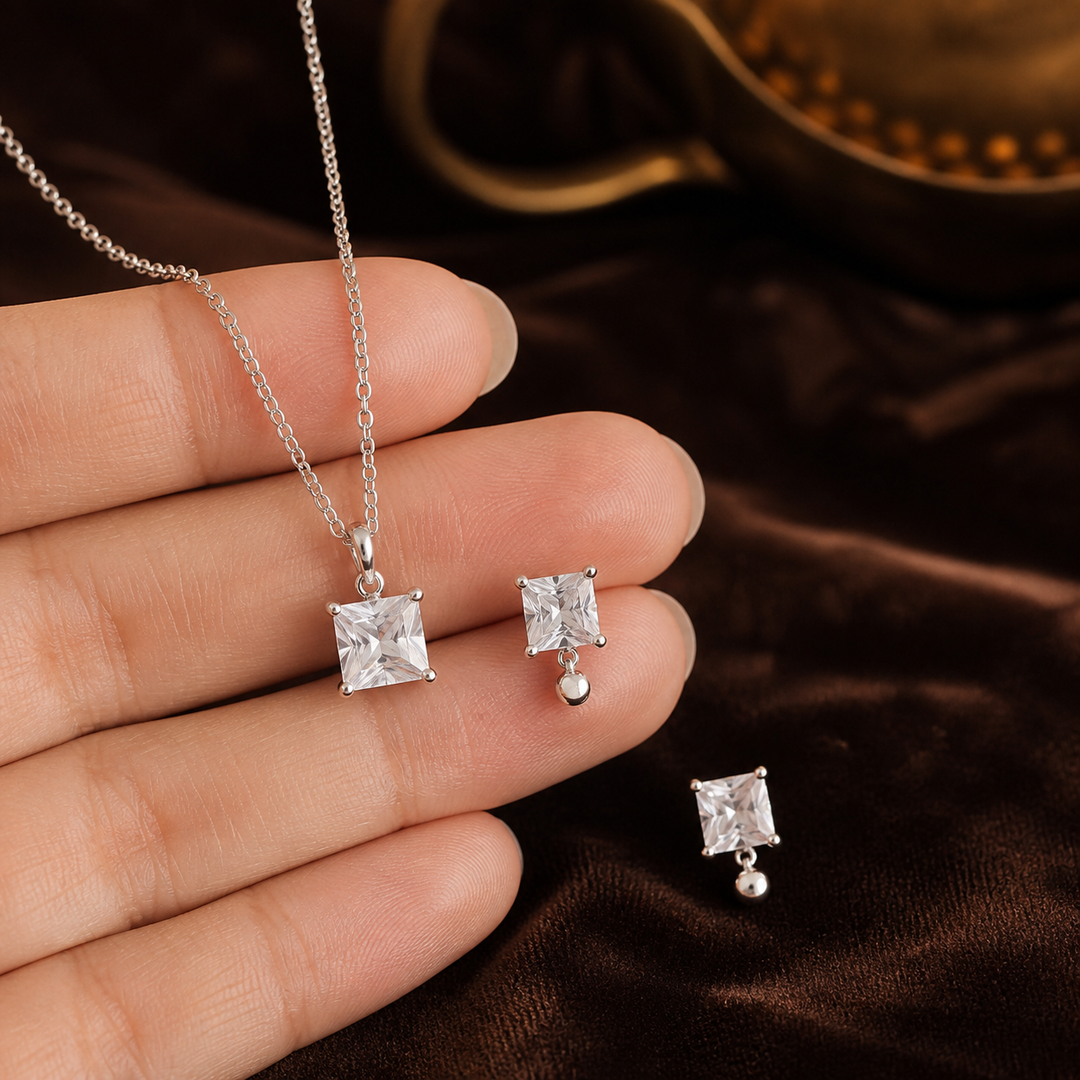White CZ Pendant Necklace & Earring Set - 925 Sterling Silver - hand-held scale view - Tarashya Jewels