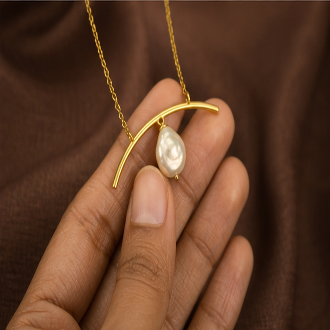 Arced Pearl Necklace - Brass - hand-held scale view - Tarashya Jewels