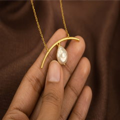 Arced Pearl Necklace - Brass - hand-held scale view - Tarashya Jewels