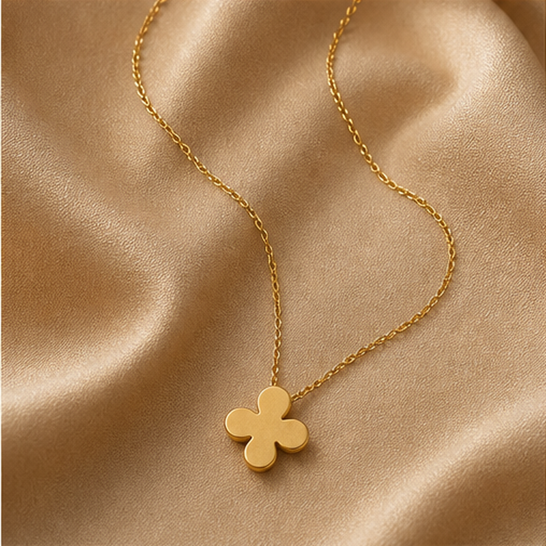 Four-Leaf Clover Necklace - Brass - flat lay - Tarashya Jewels
