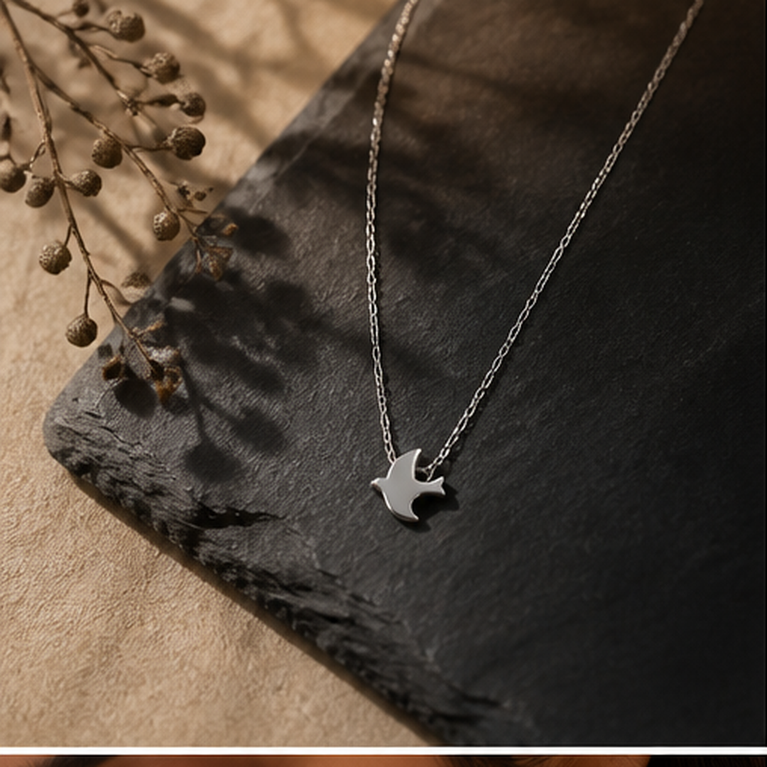 Dainty Bird Necklace - 925 Sterling Silver - flat lay - Tarashya Jewels