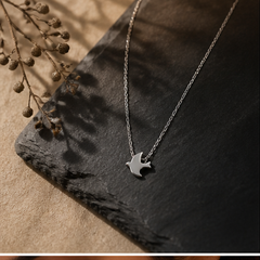 Dainty Bird Necklace - 925 Sterling Silver - flat lay - Tarashya Jewels