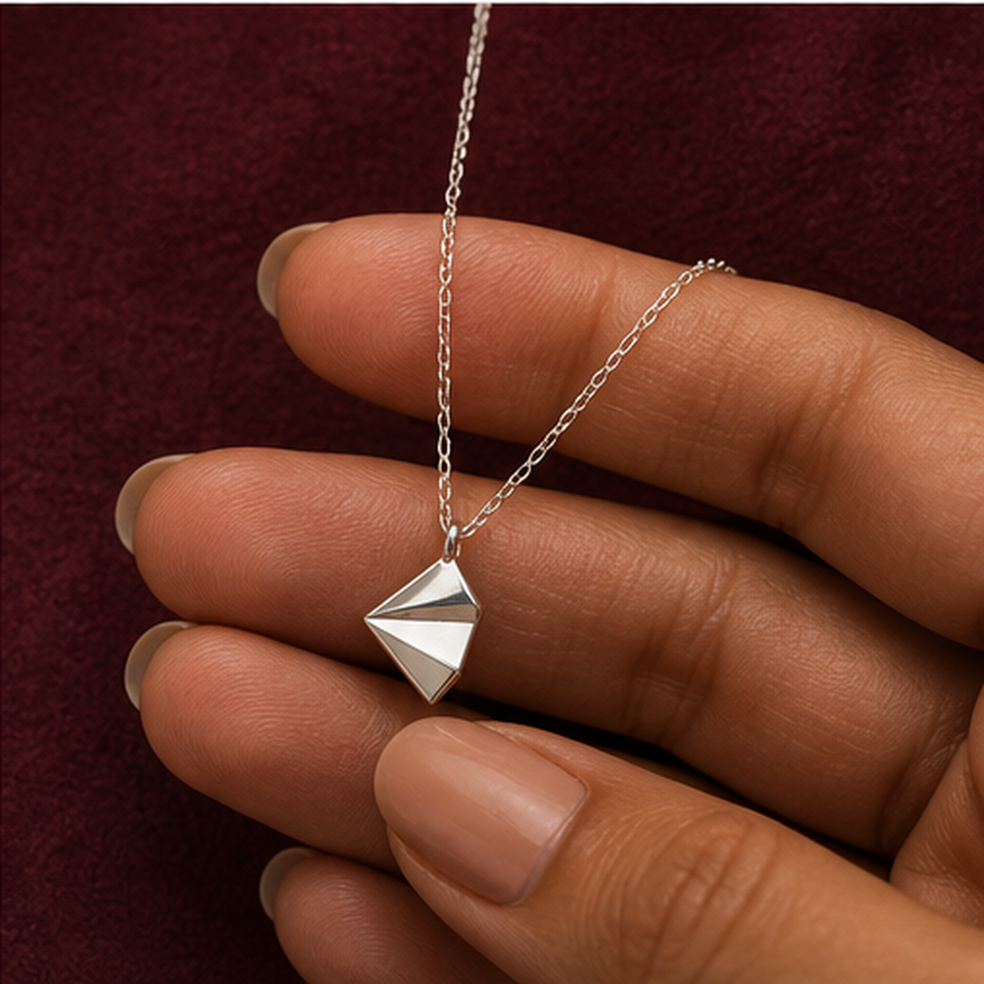 Dainty Kite Necklace - 925 Sterling Silver - hand-held scale view - Tarashya Jewels