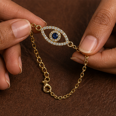 Evil Eye Bracelet - Brass - hand-held scale view - Tarashya Jewels