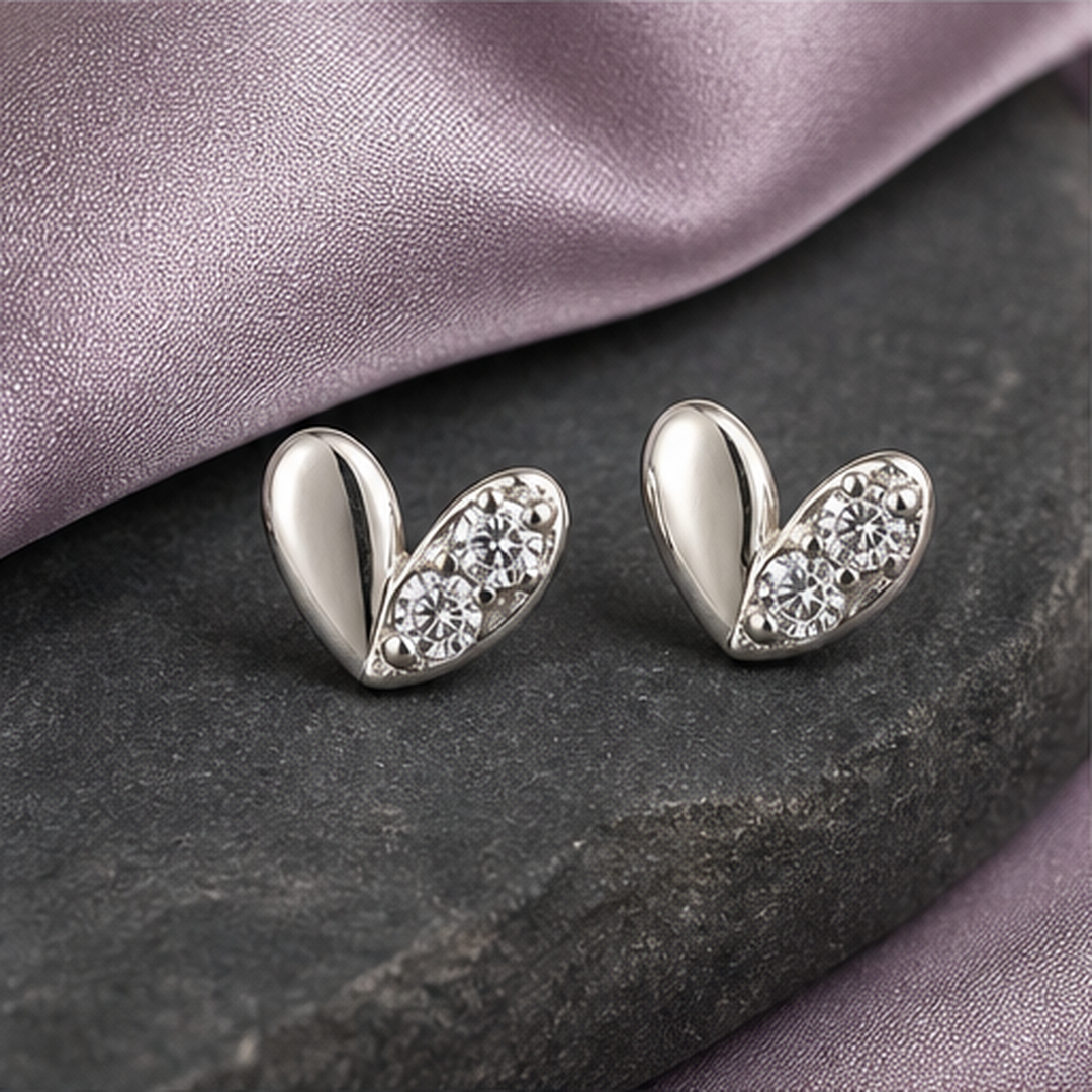 Butterfly Stud Earrings - 925 Sterling Silver - flat lay - Tarashya Jewels
