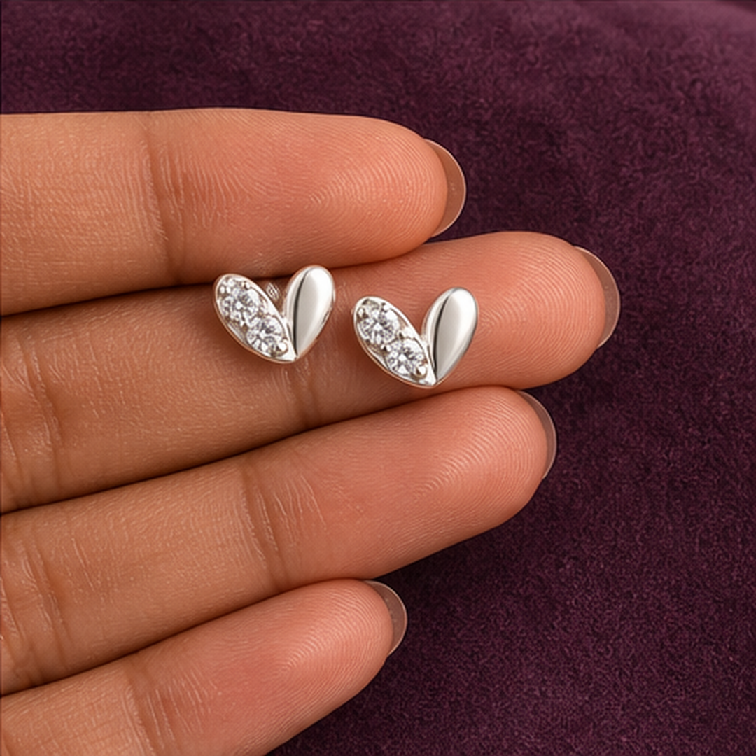 Butterfly Stud Earrings - 925 Sterling Silver - hand-held scale view - Tarashya Jewels