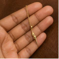 Lightning Bolt Necklace - Brass - hand-held scale view - Tarashya Jewels