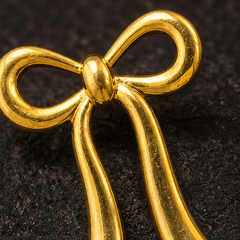 Ribbon Bow Earrings - Brass - close-up detail - Tarashya Jewels