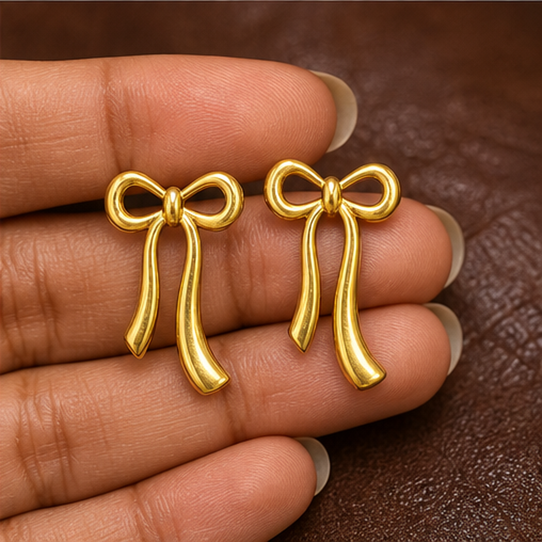 Ribbon Bow Earrings - Brass - hand-held scale view - Tarashya Jewels