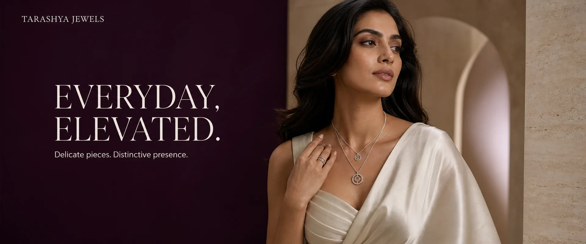 South Asian woman wearing a delicate silver pendant necklace